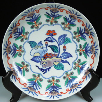 Unusual mark on Asian plate 