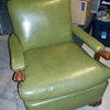 Green Naugahyde recliner chair