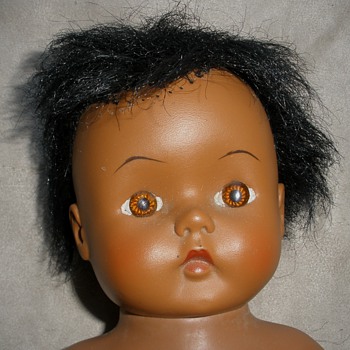 Who is this doll?!?!  Is she Black or Native American?  Who made her?