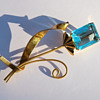 Coro sterling vermeil brooch with blue "gem"