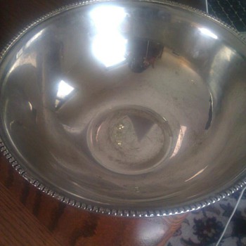 Silver bowl marked "RR International and Made in India". Silver plate marked "Oneida" and front is etched "Myer's rum".  - Sterling Silver