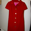Red dress coat with gold buttons and iridescent lining