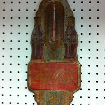 oil cans/coca cola thermometer