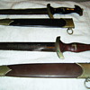 2 daggers 1 black and 1 brown/red