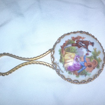 vintage Limoges porcelain hand mirror. "serenade"