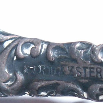i need info on this item. i cant make out maker name. please help