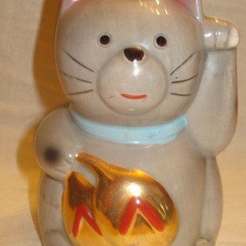 "MANEKI NEKO" AND OLD JAPANESE TRADITION.