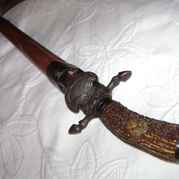 1898 Hunting Sword with skinning knife, blades are fully scrolled front and back Mint Condition