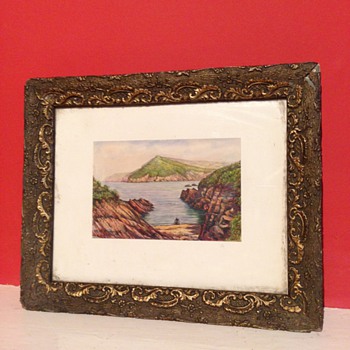 A lovely little painting of the Coast. I can't work out the Signature? 