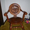 Monk rocking chair