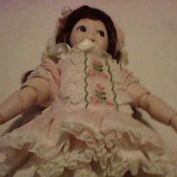 PORCELAIN  FLIRTY EYES DOLL