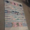 A  NICE LITTLE RUG WALL HANGING