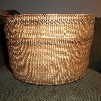 Old Tlingit Basket with "Nellie" and "Leonteen" Woven Into It