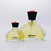 A couple of "Hooray for the 80s" perfume bottles by André Ricard.