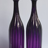 A pair of amethyst decanters