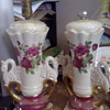 These lamps have the name "Woccall" on them under the hand painted flowers.