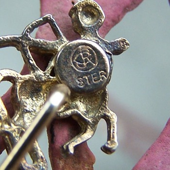 Can anyone help me identify this marking?  It is a stick pin of a half horse and half man shooting an arrow. - Fine Jewelry