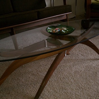 Mid Century Modern Teak base coffee table with adjustable legs and glass top