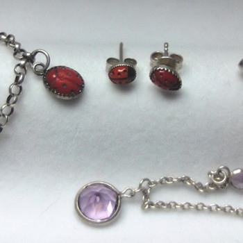 Colllection of silver (enameled) children's jewelry 