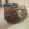 Rumph art pottery  "headless maiden"  