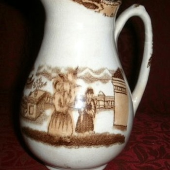 Antique brown and white transferwear creamer 6"