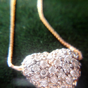 Gold Diamond Heart Pendant on chain as a reminder of New York