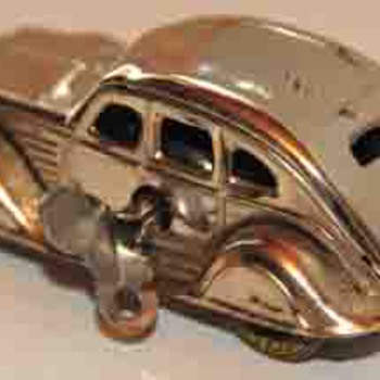 I have a few vintage wind up toys...would like a little history....thx