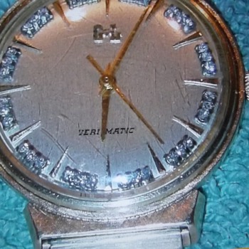 Genser Lee.   14 k solid gold case