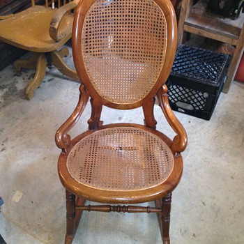 Appears to be a Rattan Rocking Chair - Furniture