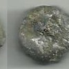 Ancient Roman weight? Also necklace?