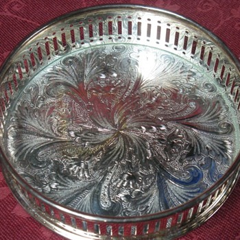 silver coaster holder.