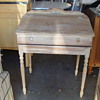 childs slant top desk with scroll inserted 