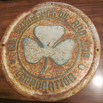 Shamrock tin sign & a  Tulsa Crude Oil Co. sign