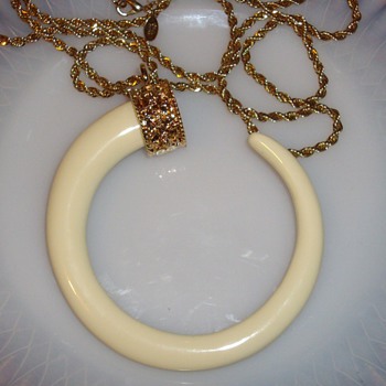KJL necklaces and a Trifari set.