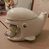 The fisherman fished. Do you know something about this teapot?
