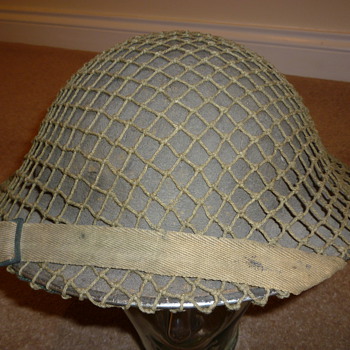 British WW11 helmet with cammo net. - Military and Wartime