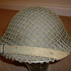 British WW11 helmet with cammo net.