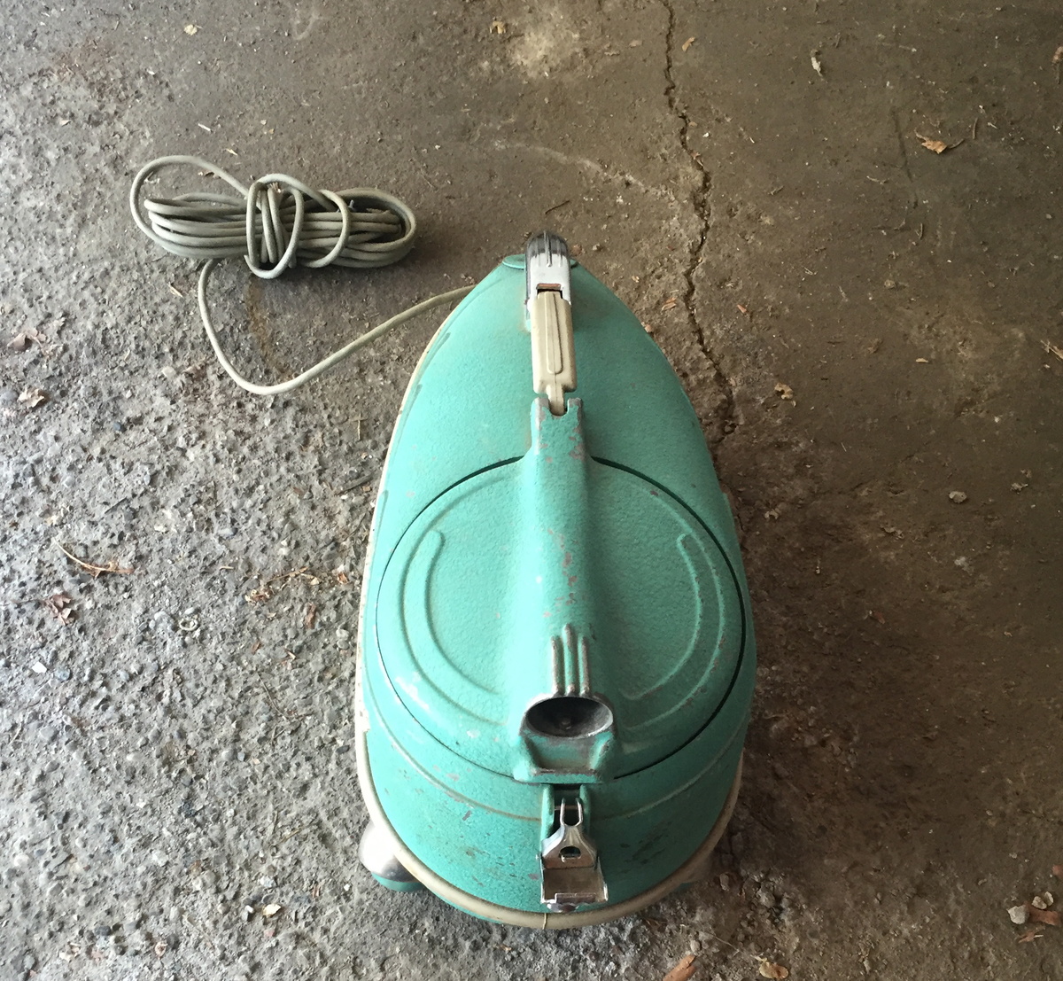Blue / Green compact vacuum cleaner. Collectors Weekly