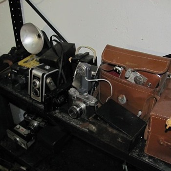 antique cameras, railroad lights, fire extinguisher - Cameras