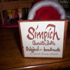 Can someone please tell me about my Simich Santa? His age and name
