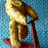 Antique Fewo Teddy Bear on a Scooter Toy