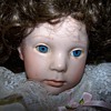 Porcelain doll with no marks on neck