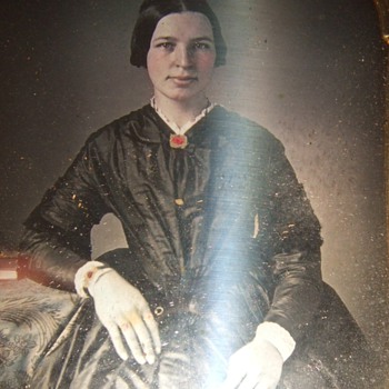 Sixth plate daguerreotype of woman with jewelry