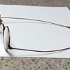 Vintage eye glasses with tin case