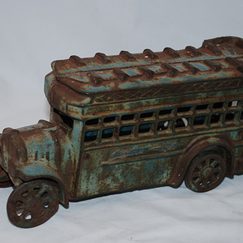 Antique cast iron toy bus, need help for ID?