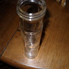 Tall clear bottle