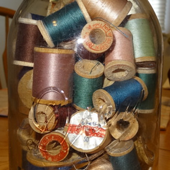 Yard sale find Old Drey Jar with Wood Thread Spools - Bottles