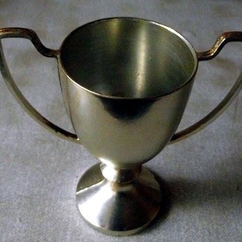 miniture drinking cup or football cup?