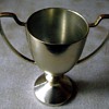 miniture drinking cup or football cup?