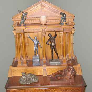 The corner cabinet in our Living room with metal figures